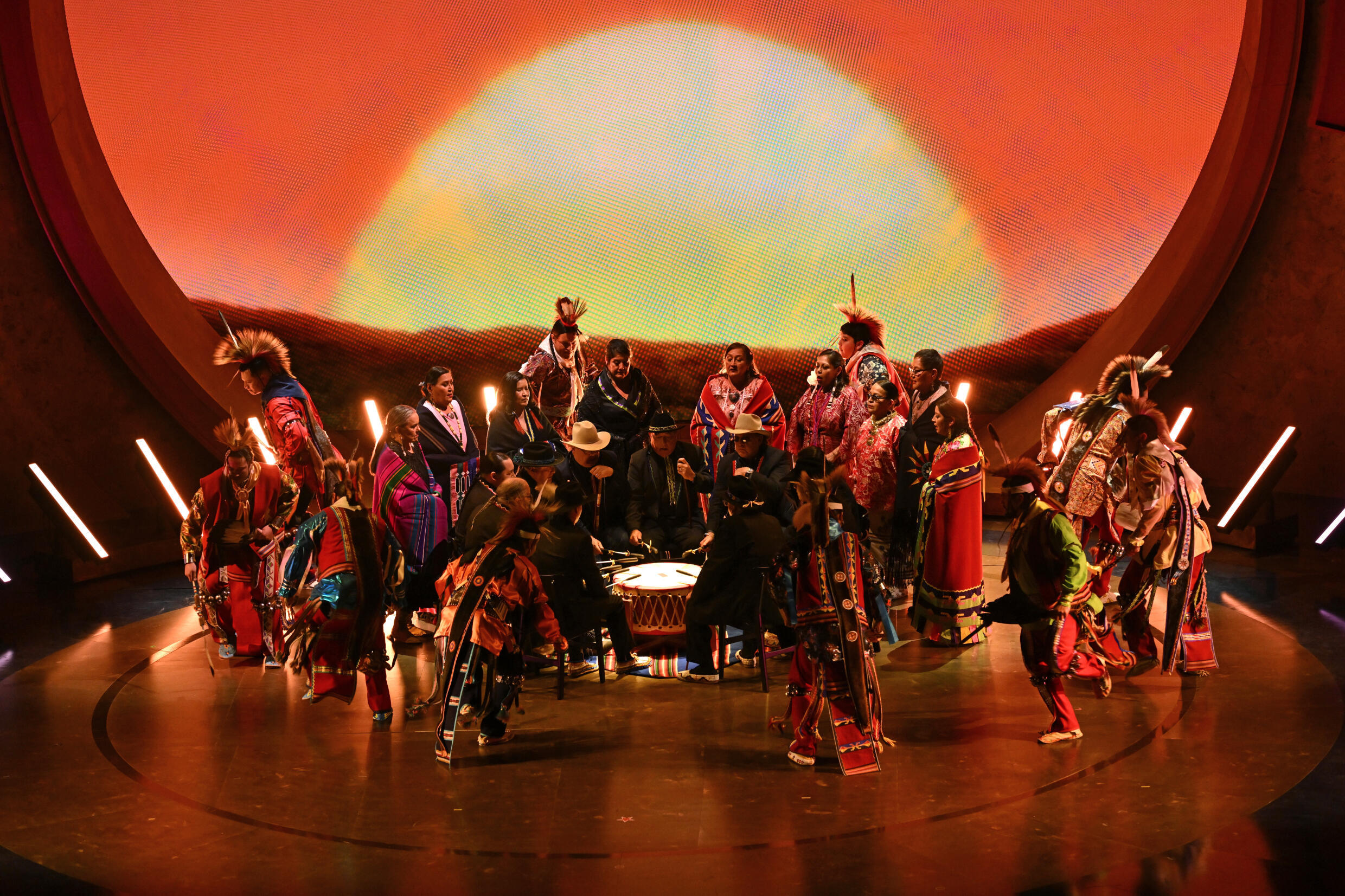 Scott George (C) and Osage singers and dancers perform the nominated song from 'Killers of the Flower Moon'