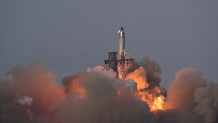 A SpaceX Super Heavy booster carrying the Starship spacecraft lifts off on its 10th test flight at the company's launch pad in Starbase, Texas, US, August 26, 2025.
