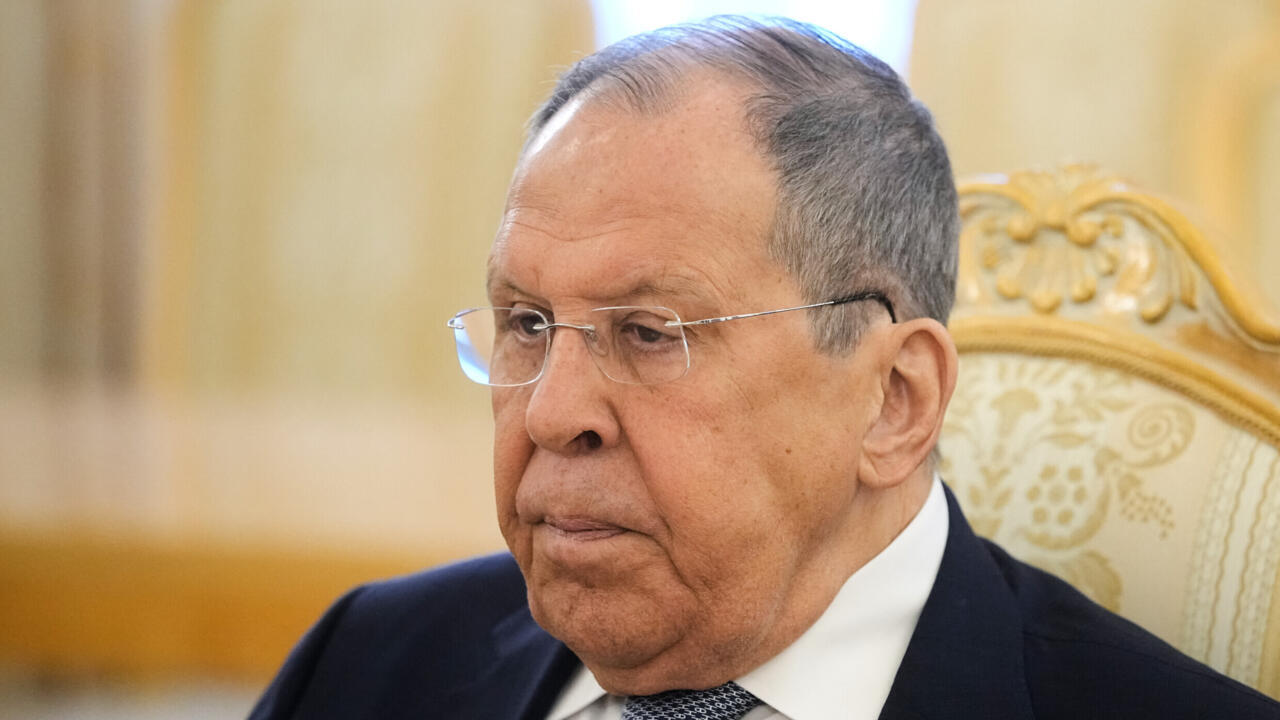 Russian Foreign Minister Sergey Lavrov listens to Jordan's foreign minister during their talks at Zinaida Morozova's Mansion in Moscow on August 20, 2025.