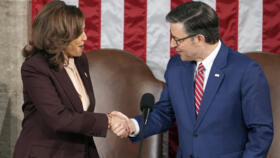Vice President Kamala Harris shakes hands with House Speaker Mike Johnson, as a joint session of Congress convenes to certify President-elect Donald Trump's election victory on January 6, 2025, at the US Capitol in Washington.
