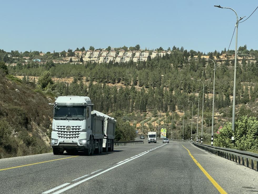 An Israeli settlement can be seen in the backdrop of Route 60, between Nablus and Ramallah.
