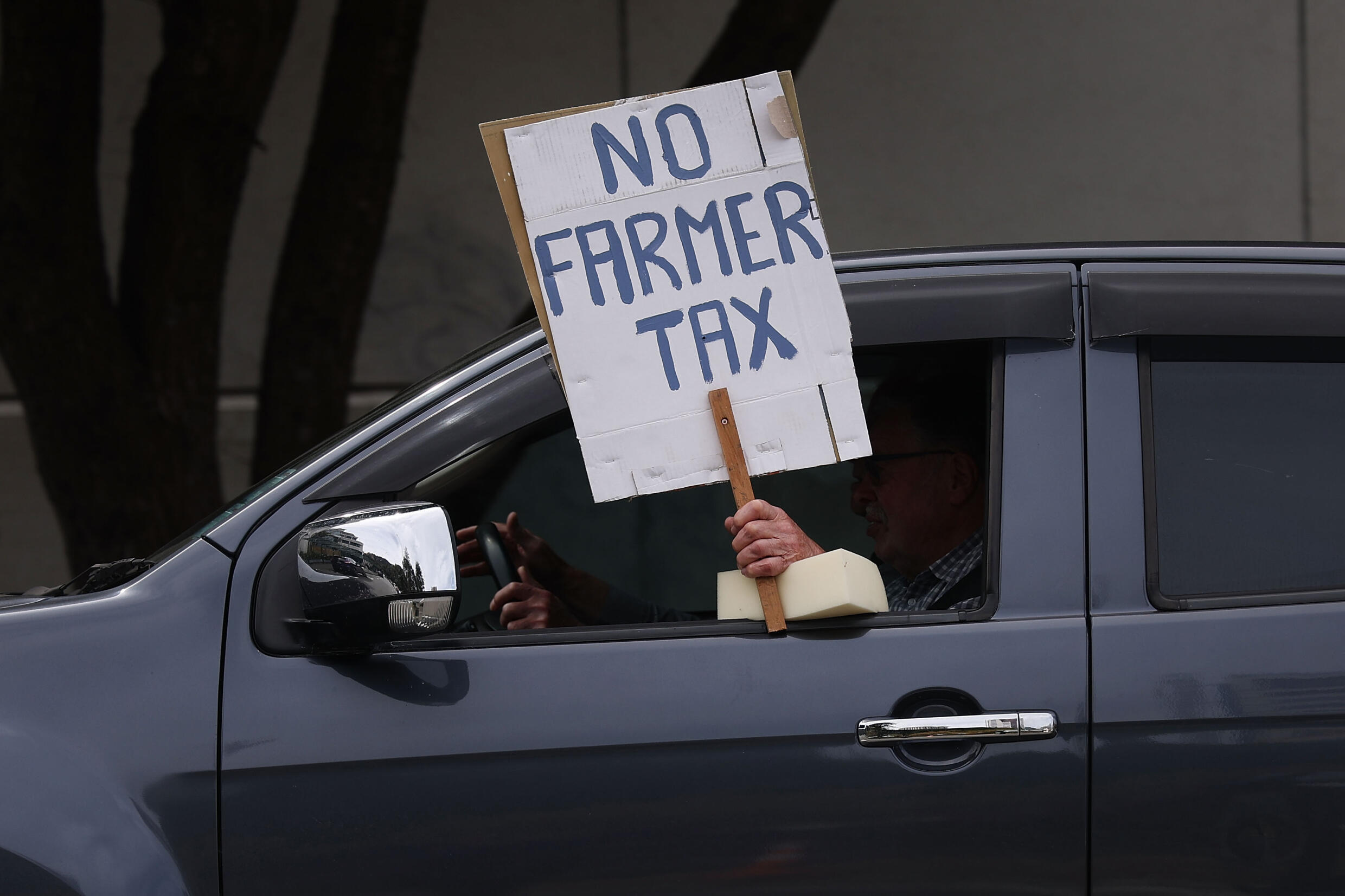 Farmers protest against the taxation of greenhouse gas emissions by belching livestock and gassing, on October 20, 2022 in Wellington, New Zealand
