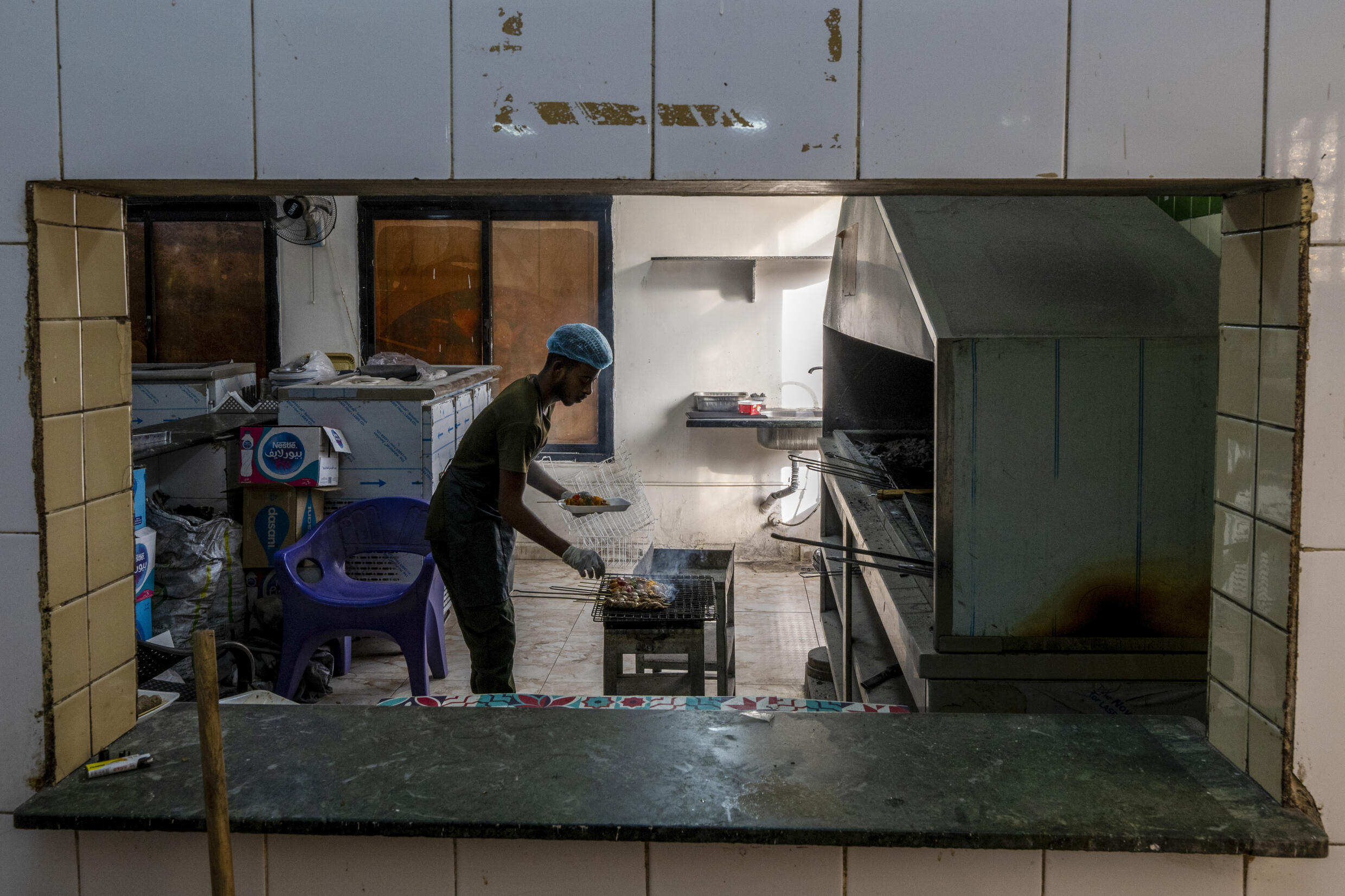 Egypt's Sudanese refugees using rich cuisine to build new lives