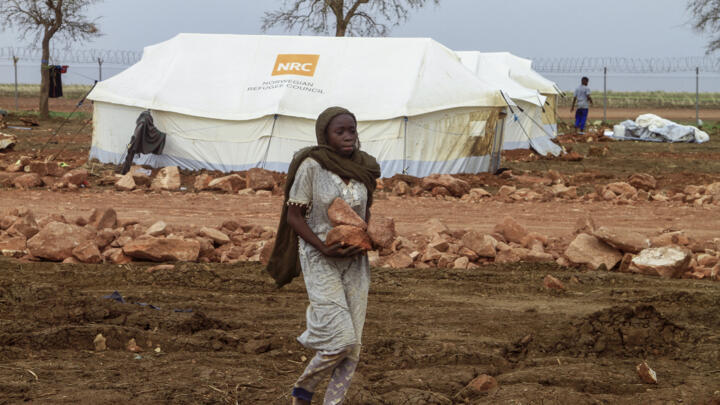 People set up their tents at a camp for internally displaced Sudanese from Sennar state, in the al-Huri district of Gedaref city in the east of war-torn Sudan on July 14, 2024.