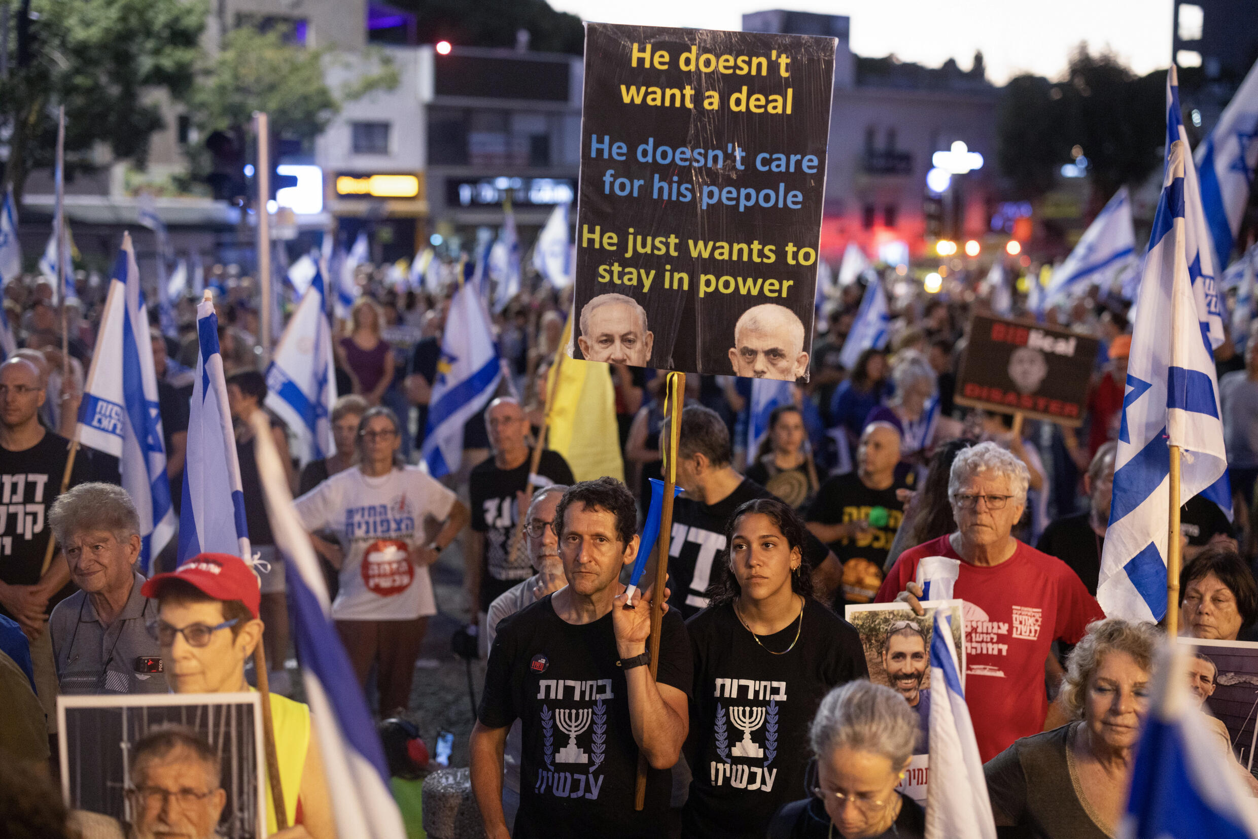 Israeli anti-government protesters rally calling for a hostage release deal, in the coastal city of Haifa