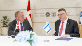 Denmark's Foreign Minister Lars Loekke Rasmussen (L) and Israel's Foreign Minister Gideon Saar have taken seat for talks as they meet in Jerusalem, Israel, on September 7, 2025.