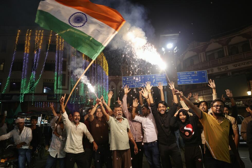 Indian cricket fans celebrate in Varanasi