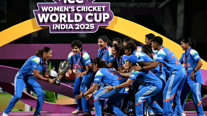 India's players celebrate after winning the ICC Women's Cricket World Cup 2025