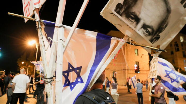 Protesters take part in a demonstration against Israeli PM Benjamin Netanyahu on potentially the last day of his premiership, Jerusalem, June 12, 2021.