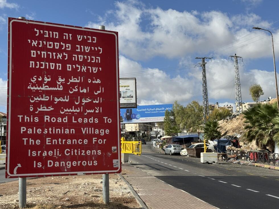 “This road leads to Palestinian village. The entrance for Israeli citizens is dangerous,” reads a sign at the exit of Ma'ale Adumim. 
