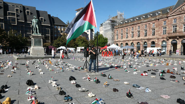 Shoes laid out on Place Kleber symbolising Palestinians killed during Israel's offensive on the Gaza strip, in Strasbourg, eastern France, on September 20, 2025. 