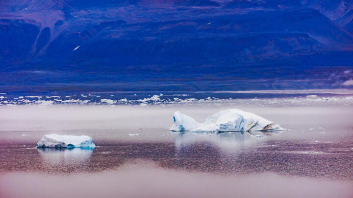 Icebergs float in the Baffin Bay near Pituffik, Greenland on July 20, 2022, as captured on a NASA Gulfstream V plane while on an airborne mission to measure melting Arctic sea ice.