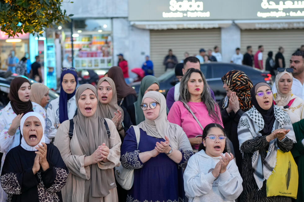 People take part in a youth led protest calling for education and healthcare reforms, in Tangier, Morocco, Saturday, Oct. 18, 2025.