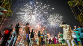 People watch fireworks light up the sky as part of Diwali celebrations in Mumbai in October.