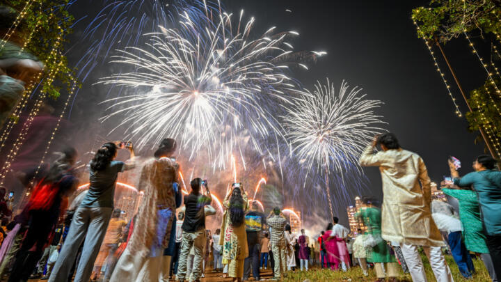 People watch fireworks light up the sky as part of Diwali celebrations in Mumbai in October.