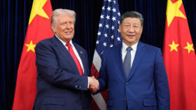 US President Donald Trump, left, and Chinese President Xi Jinping shake hands before their meeting at Gimhae International Airport in Busan, South Korea, Thursday, October 30, 2025. 