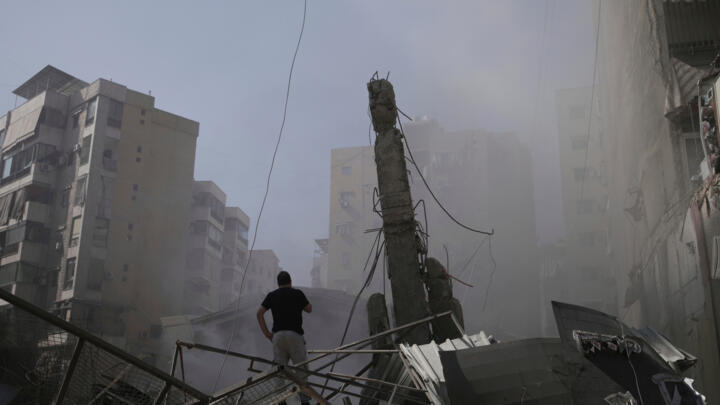 A person inspects the destruction after Israeli army strikes in the Dahiyeh suburb of Beirut, Lebanon, June 6, 2025.