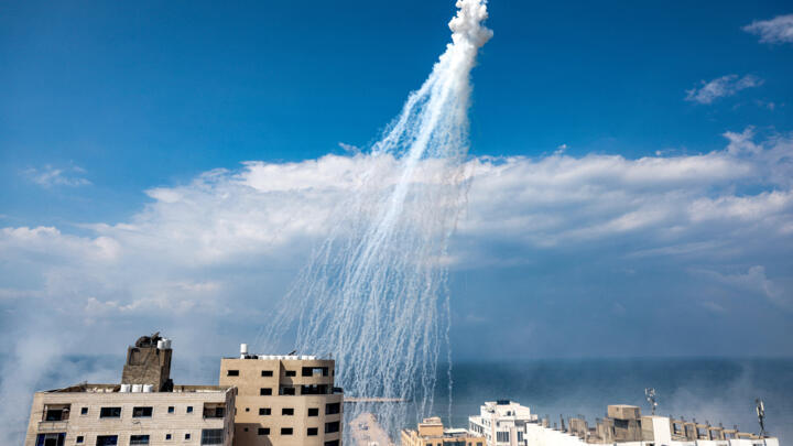 Smoke from Israeli incendiary munitions is pictured over the Gaza City seaport on October 11, 2023.