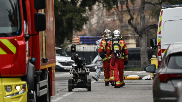 Members of Marseille Naval Fire Battalion (Marins-Pompiers de Marseille) arrive at the Russian consulate in Marseille, after three improvised explosive devices were thrown, on February 24, 2025.