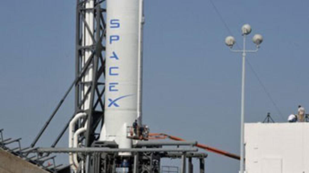 SpaceX commercial rocket returns to Earth