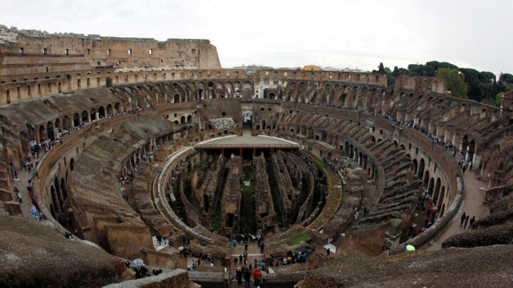 FILE PHOTO: People visit Rome's ancient Colosseum, Oct. 14, 2010.