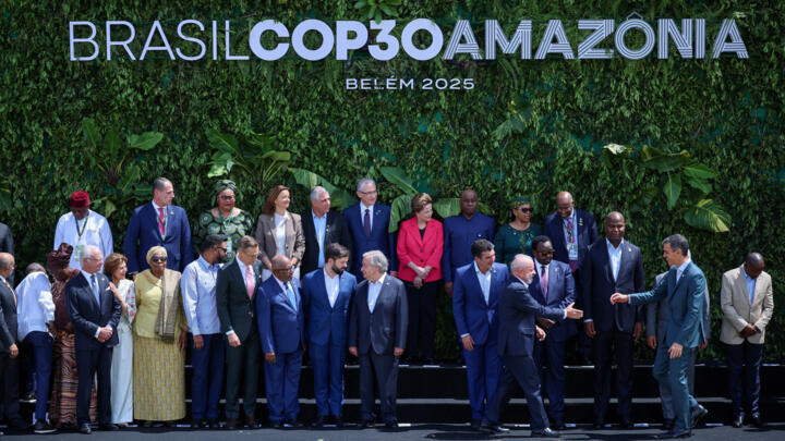 Brazil's President Luiz Inacio Lula da Silva greets Spain's Prime Minister Pedro Sanchez as they and other delegates meet ahead of the COP30 climate conference in Belem, Brazil on November 7, 2025. 