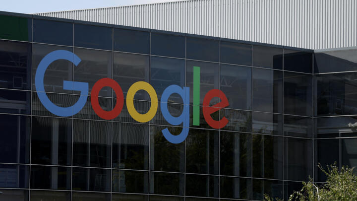 A sign is posted on the exterior of a building on the Google headquarters campus on July 23, 2025 in Mountain View, California. 