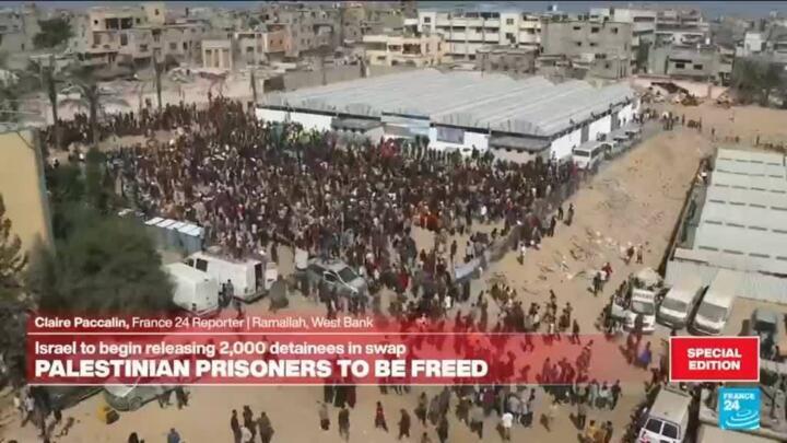 Buses carrying Palestinian prisoners freed under Gaza truce deal arrive in Ramallah