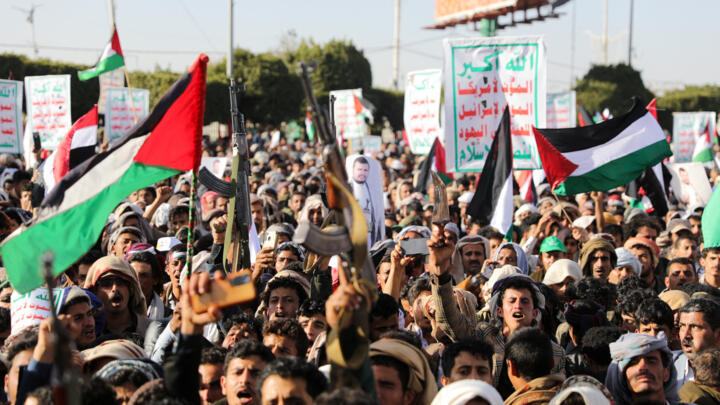 Supporters of the Houthi movement rally to denounce air strikes launched by the US and UK on Houthi targets, in Sanaa, Yemen January 12, 2024.