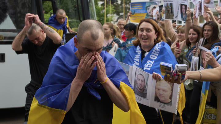 Ukrainian soldiers receive an emotional welcome in the northern Chernyhiv region after their release in a prisoner swap with Russia on May 25, 2025.
