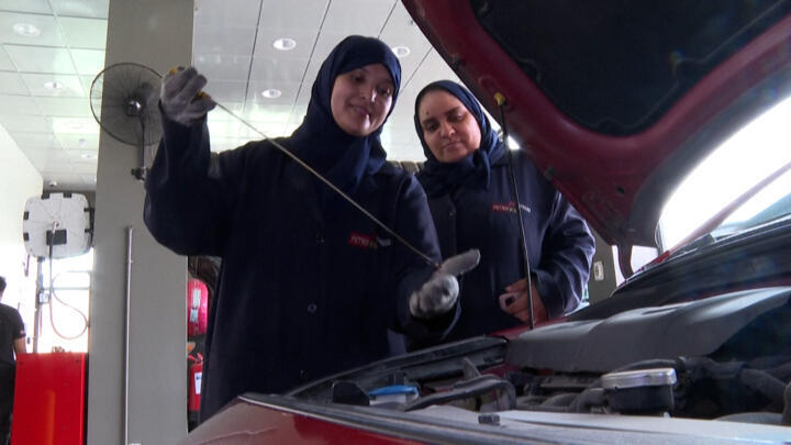 Mechanics at work in a garage in Jeddah, Saudi Arabia, on May 26, 2022.