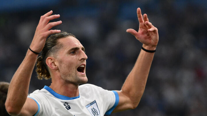Marseille's French midfielder #25 Adrien Rabiot celebrates after scoring during their ligue 1 football match Olympic of Marseille (OM) against stade Rennais at the Velodrome stadium in Marseille on May 17, 2025.