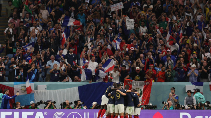 France players celebrate their third goal in their opening 2022 World Cup match against Australia on November 22, 2022.