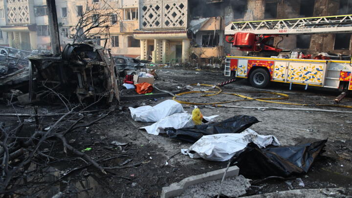 Dead bodies in plastic bags lie on the ground after a Russian strike on Ternopil, Ukraine, on Wednesday, November 19, 2025.