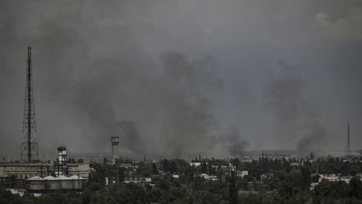 Smoke and dirt rise above the Ukrainian city of Sievierodonetsk amid clashes between Russian and Ukrainian forces on June 2, 2022.