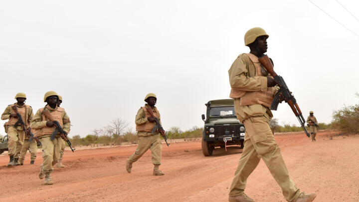 File photo of Burkina Faso soldiers during a training drill at a  military camp near Ouagadougo in April 2018.