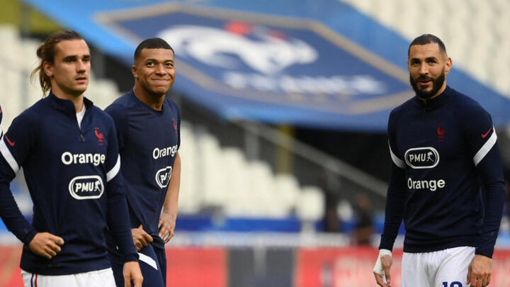 French strikers Antoine Griezmann, Kylian Mbappé and Karim Benzema warm up ahead of the France v Bulgaria warm-up friendly at Stade De France in Saint-Denis, on the outskirts of Paris on June 8, 2021.