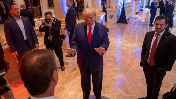 Former US President Donald Trump talks to the press on the grounds of his Mar-a-Lago resort on midterm elections night in Palm Beach, Florida, US on November 8, 2022.  