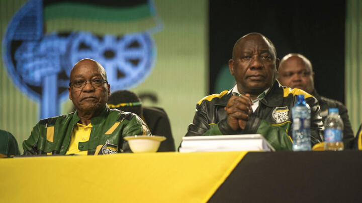 In this July 5, 2017 file photo, South Africa’s then president Jacob Zuma (L) and then deputy president Cyril Ramaphosa (R) attend a closing session of the African National Congress policy conference in Johannesburg.