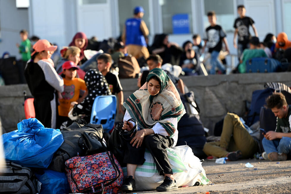 Des familles entières arrivent au poste-frontière d'Islam Qala entre l'Iran et l'Afghanistan, après les opérations de retour forcé, le 28 juin 2025.