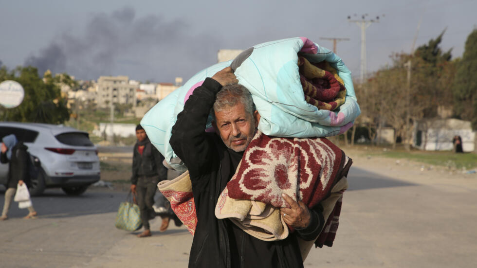 Palestinians fleeing the Israeli offensive on Khan Younis arrive in Rafah, Gaza Strip on Wednesday, Feb. 14, 2024.