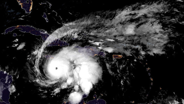 Hurricane Melissa, which has developed into a Category 4 hurricane, moves westward in the Caribbean Sea towards Jamaica in a composite satellite image obtained by Reuters on October 26, 2025.