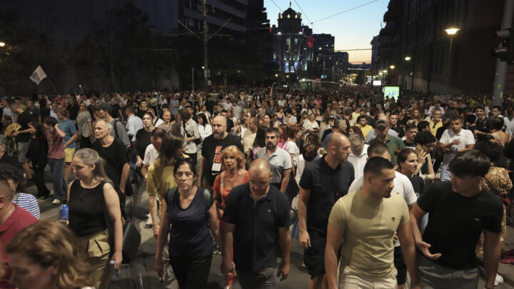 Protestors attend an anti-government rally pressing for an early election after ten months of almost daily anti-corruption demonstrations in Serbia, on September 1, 2025. 