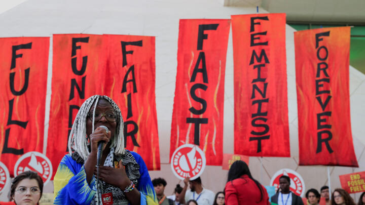 Climate activists protest against fossil fuels at Dubai's Expo City during the United Nations Climate Change Conference COP28 in Dubai, United Arab Emirates, December 12, 2023.