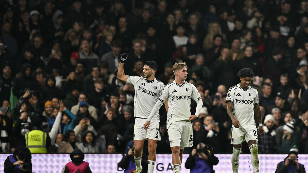 Fulham striker Raul Jimenez (L) celebrates scoring against Nottingham Forest