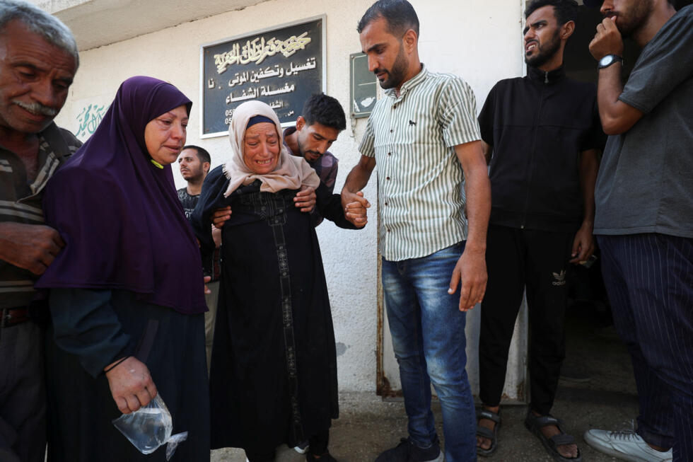 dolientes reaccionan durante el funeral de los palestinos muertos el viernes en los ataques aÃ©reos israelÃes, segÃºn el Ministerio de Sanidad de Gaza, en el Hospital Al-Shifa, en la ciudad de Gaza, 28 de junio de 2025.