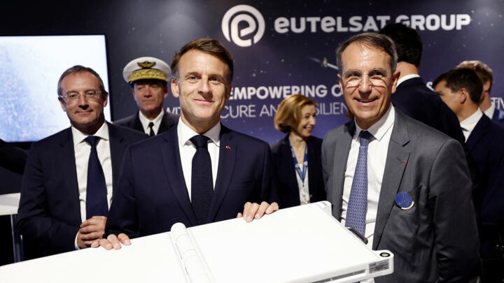 French President Emmanuel Macron visits the Eutelsat stand at the International Paris Air Show on June 20, 2025.