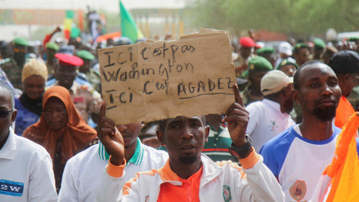Nigeriens gather in a street to protest against the US military presence in Niamey, Niger on April 13, 2024. 