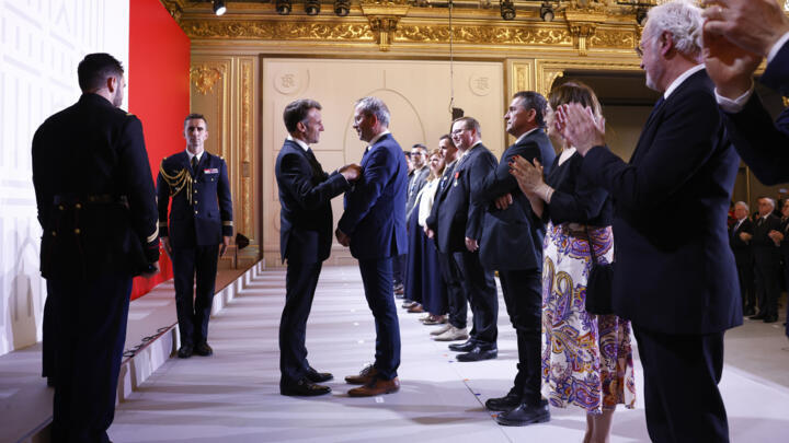 France's President Emmanuel Macron handed out multiple medals.