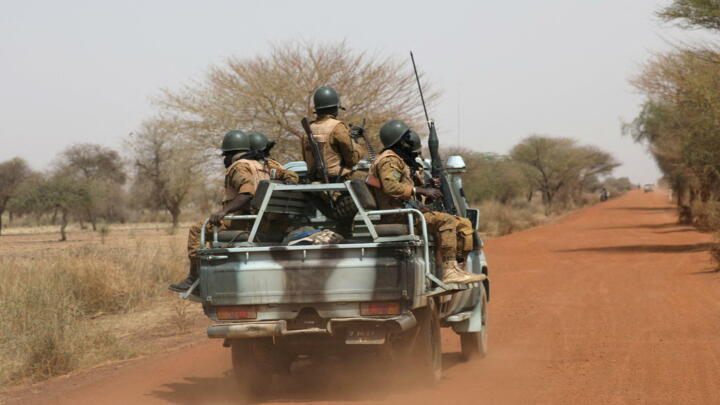 Soldiers from Burkina Faso patrol on the road of Gorgadji in the Sahel area, Burkina Faso March 3, 2019. 